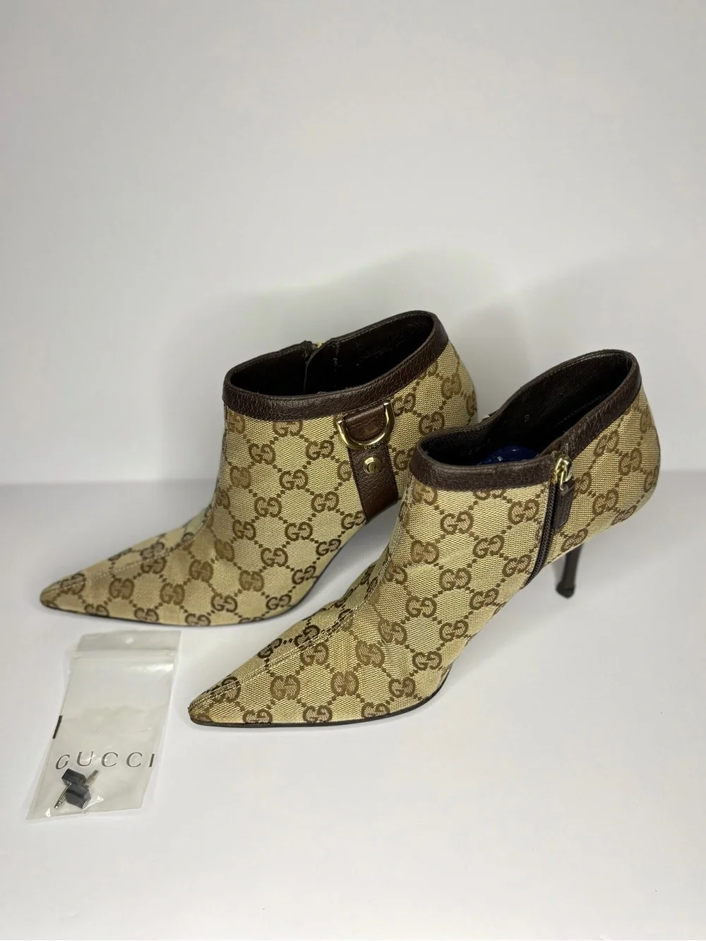 Gucci Beige GG Monogram Pointed Toe Ankle Booties with Brown Trim